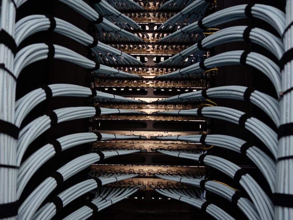 modern-building-in-austria-19166565 Organized network server cables for efficient data management.